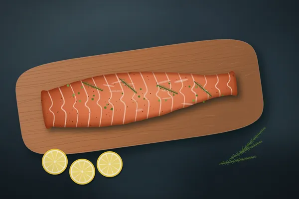 A hot-smoked salmon fillet on a cedar plank with dill, capers and lemon slices