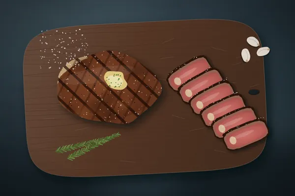 A reverse-seared ribeye with grill marks and melting herb butter, with medium-rare slices, rosemary and garlic